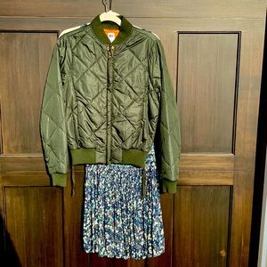 NSF green quilted bomber jacket with orange lining  size medium worn 1 time